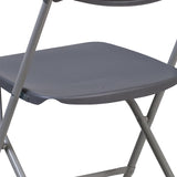 HERCULES Series 650 lb. Capacity Charcoal Plastic Fan Back Folding Chair
